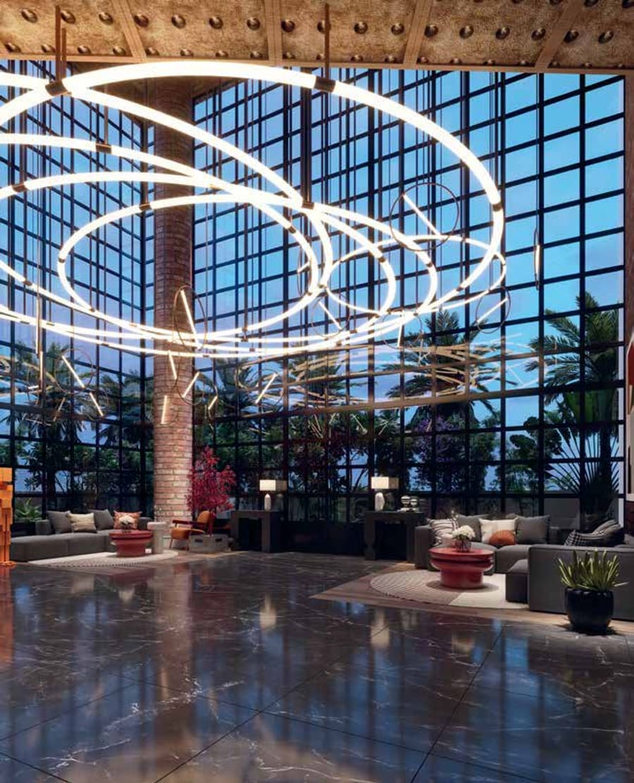Club Apas clubhouse lounge with statement lighting installation