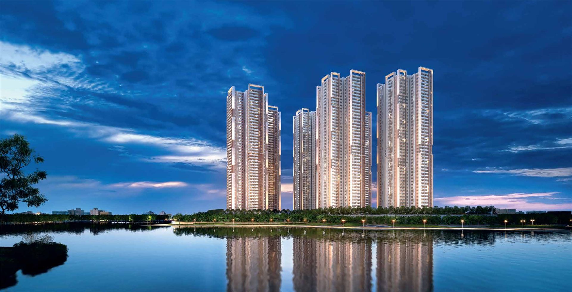 My Home Apas towers at twilight, reflected in Kokapet Lake