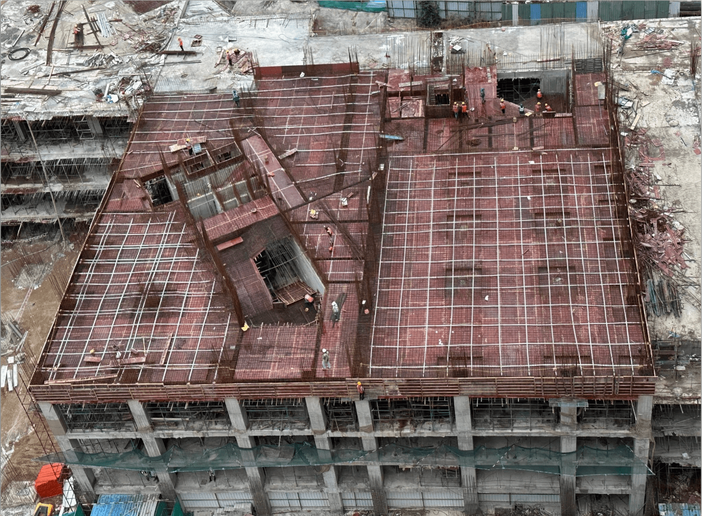 Aerial view of Club Apas clubhouse under construction, roof slab reinforcement work in progress